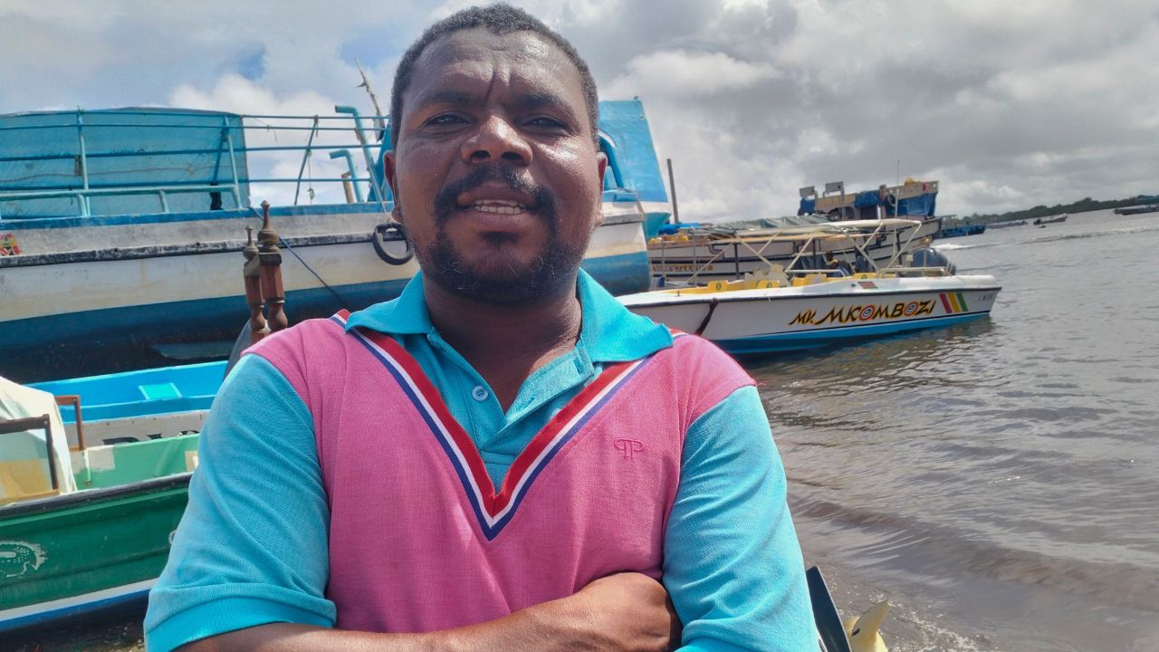 Portrait of boat operator Abdulkarim Badawy by the shore